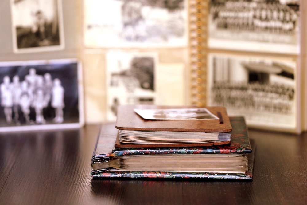 Old,Albums,With,Black,And,White,Nostalgic,Blurry,Photos,In The History of Our Valued Family-Owned Business