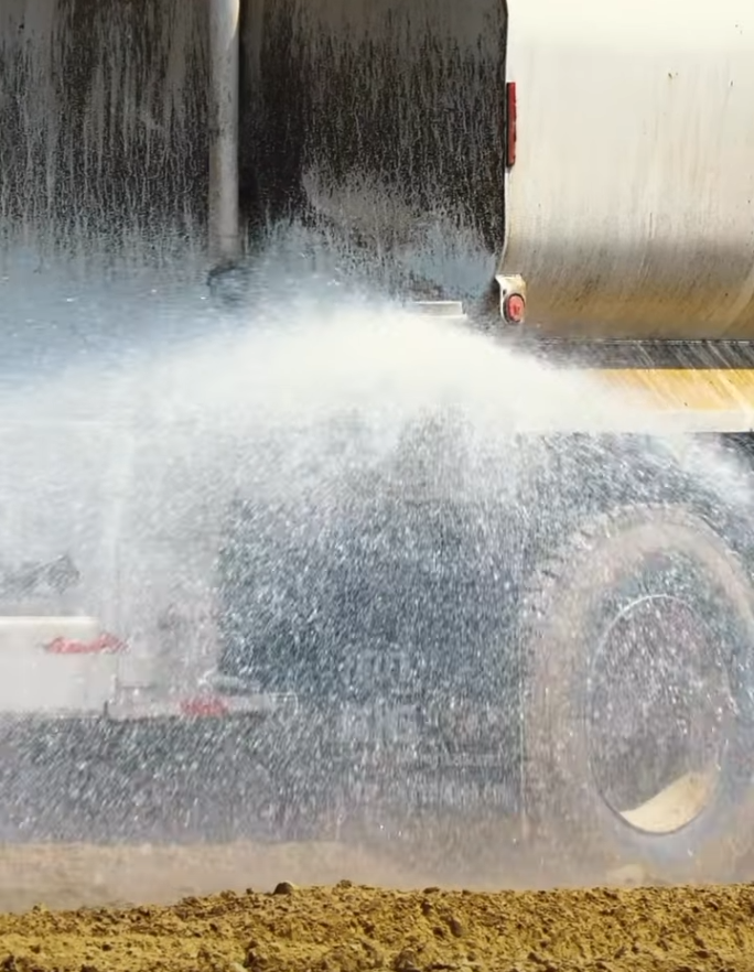 Water truck controlling dust at the Mound City TA Travel Center project