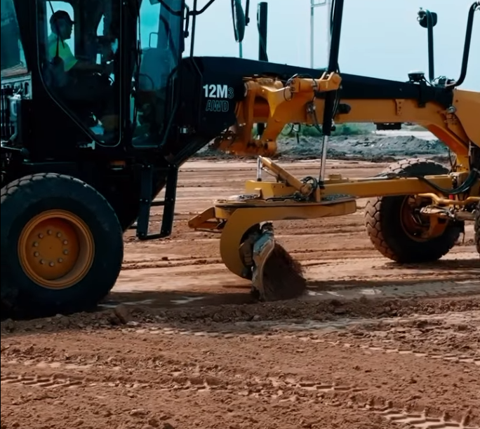Cat 12M3 motor grader fine grading at the Mound City TA Travel Center project